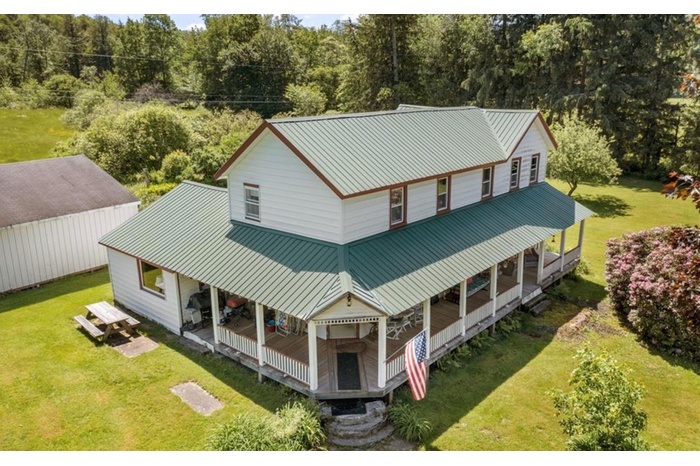 View from above of property featuring a forest