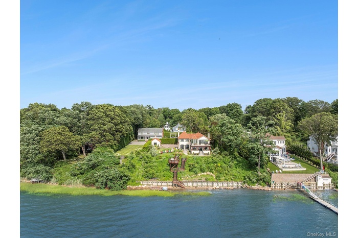 View of subject property with a nearby body of water