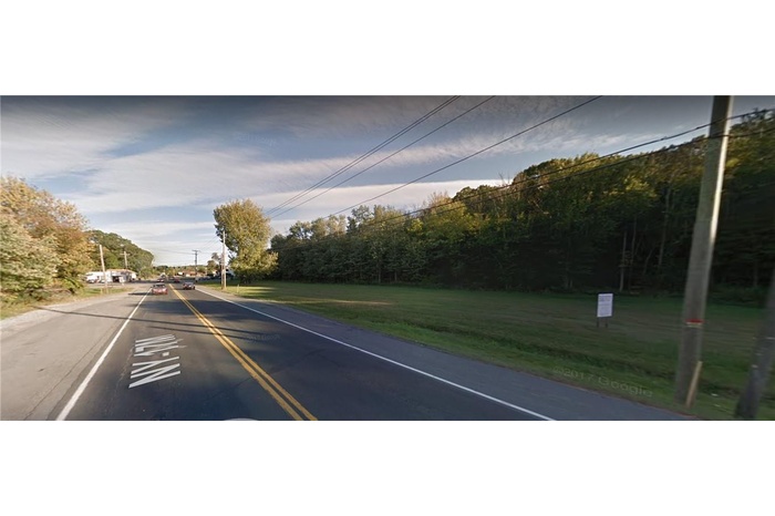 Corner signalized light with frontage on State Route 17M and Gates Schoolhouse Rd