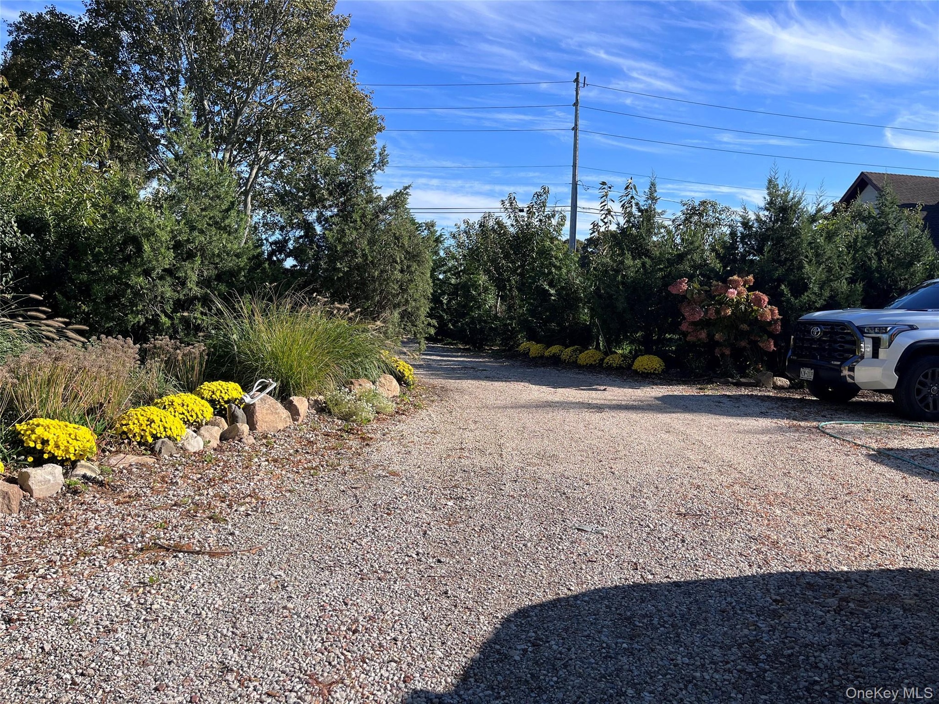 Meandering driveway to garage/outbuilding