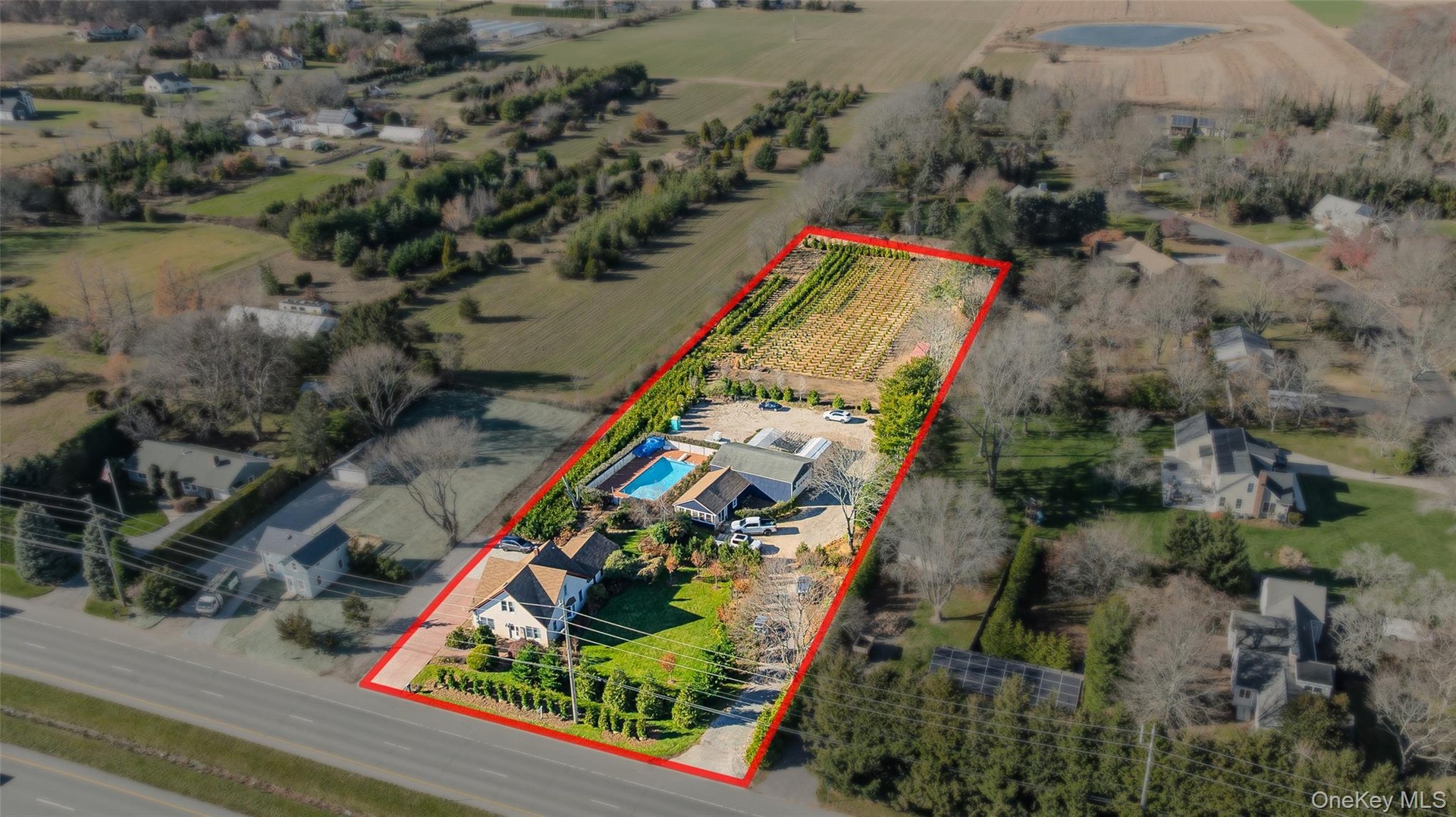 View of rural area with farmland and property parcel outlined