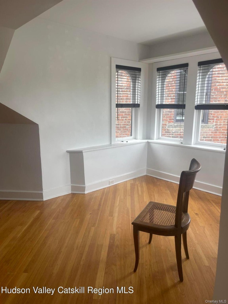 Unfurnished room featuring light wood finished floors
