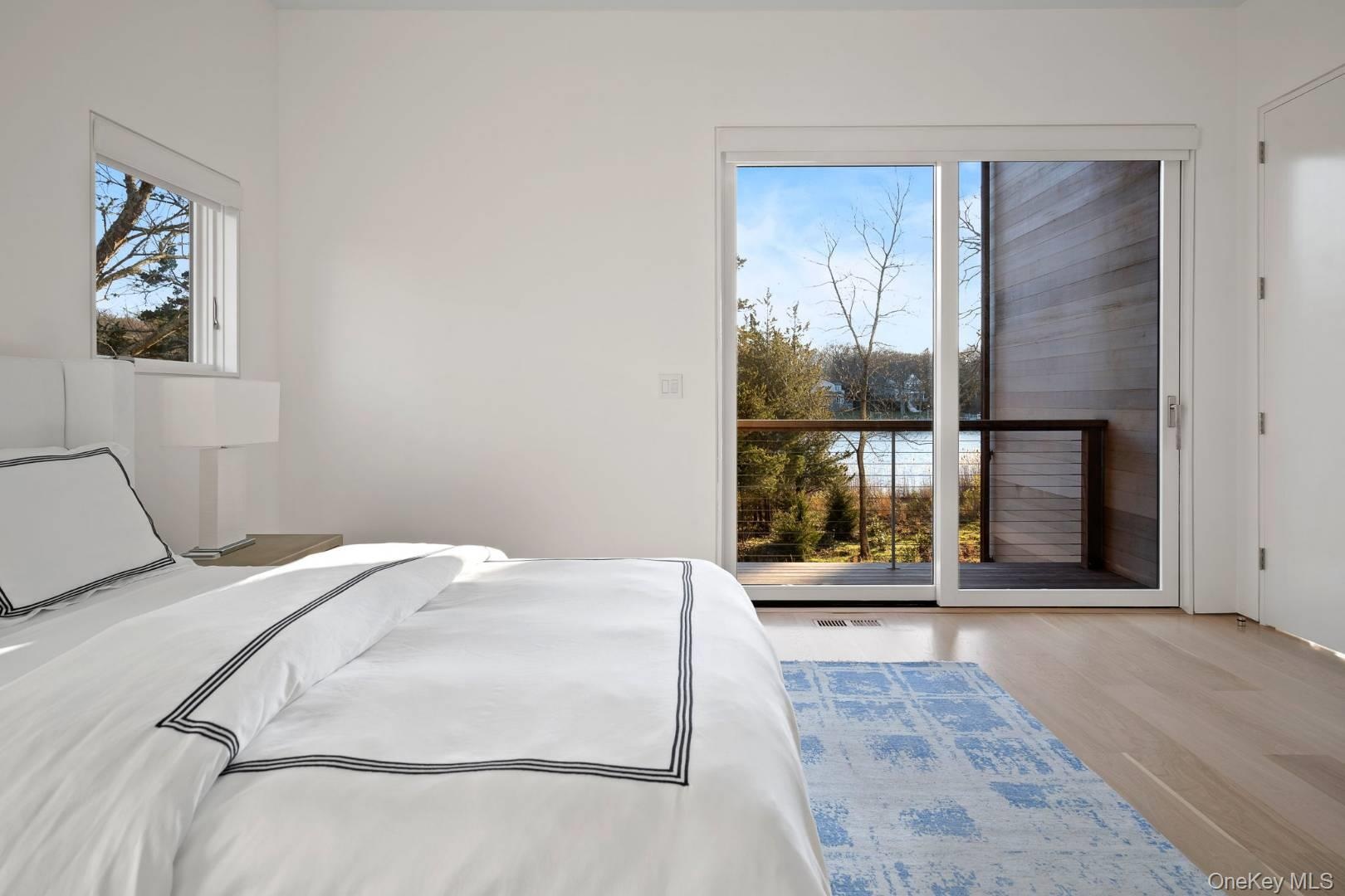 Bedroom with light hardwood / wood-style floors