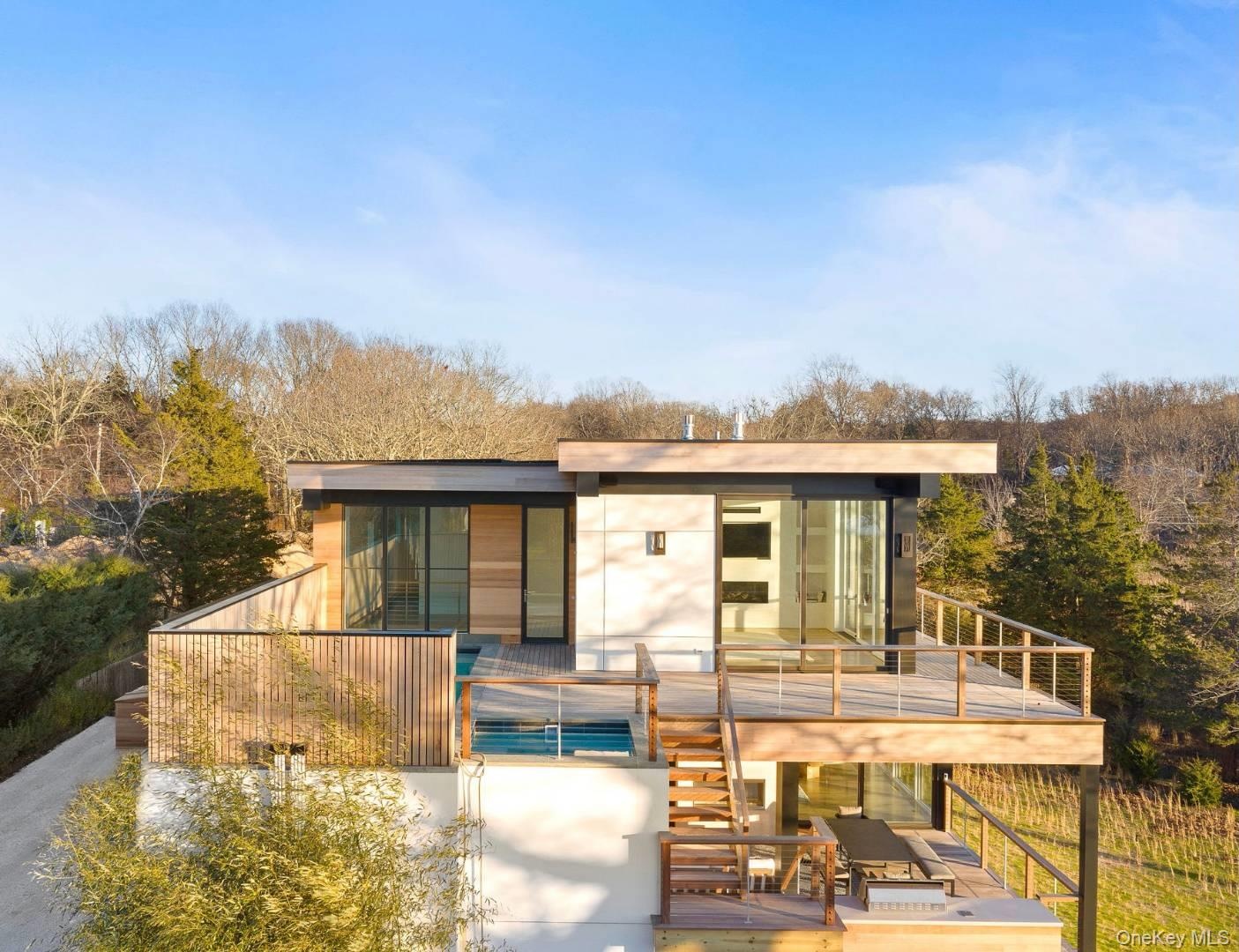 View of front of home featuring a wooden deck
