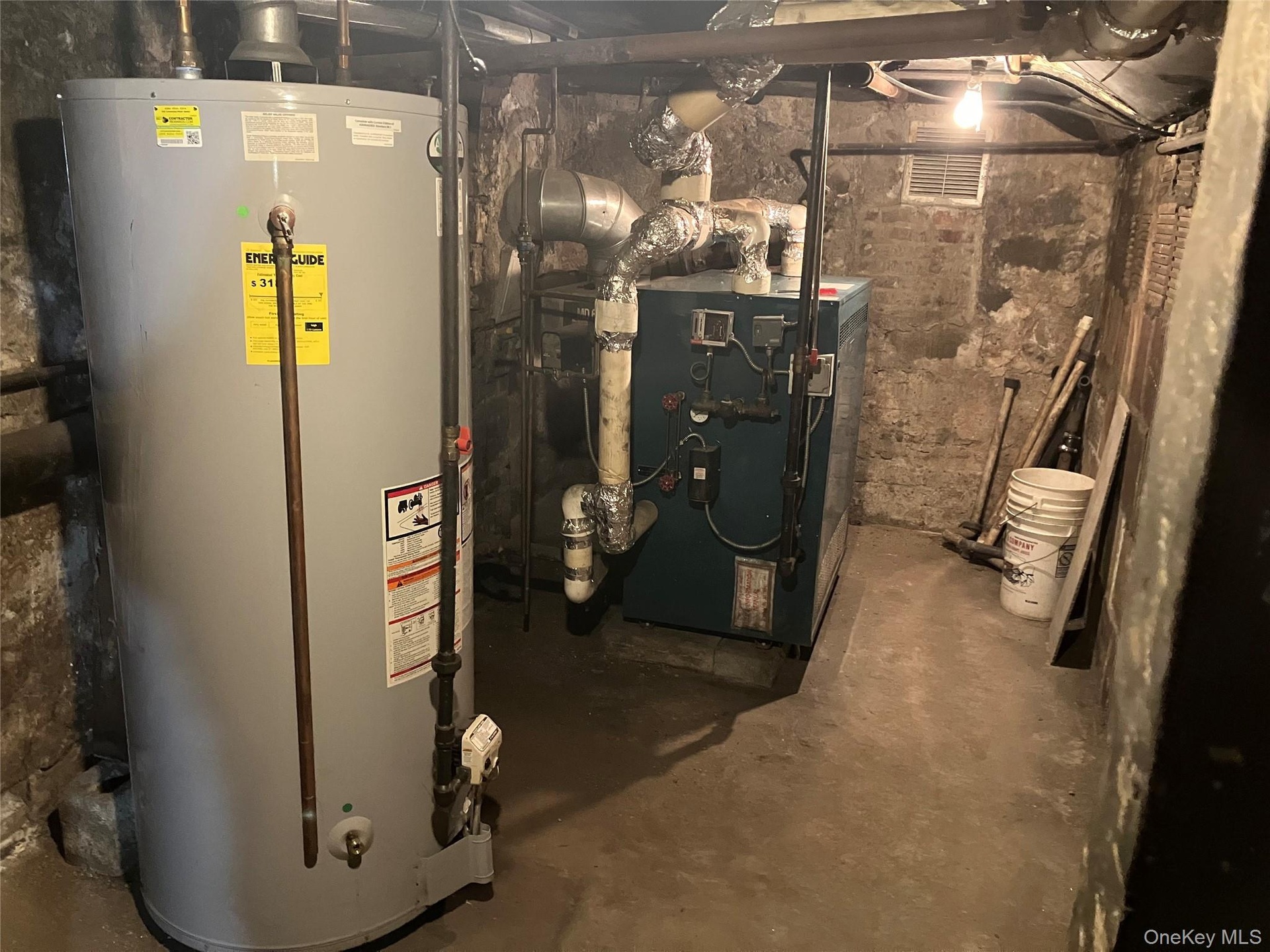 Utility room with gas water heater