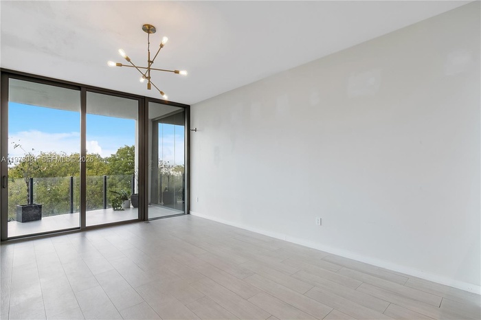 Unit will be freshly painted prior to closing, delivering the residence in clean, move-in ready condition.