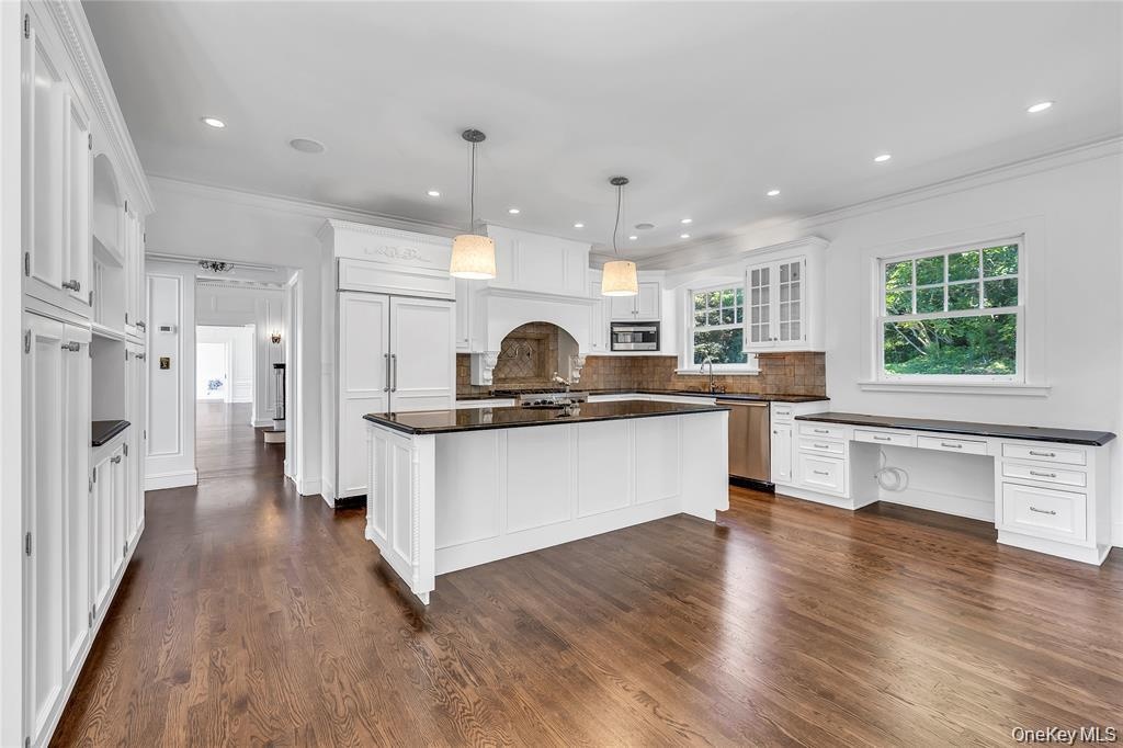 Large Granite Kitchen with Fireplace and Entrance to Both Front and Rear Yards...Plus Amazing Waterviews!