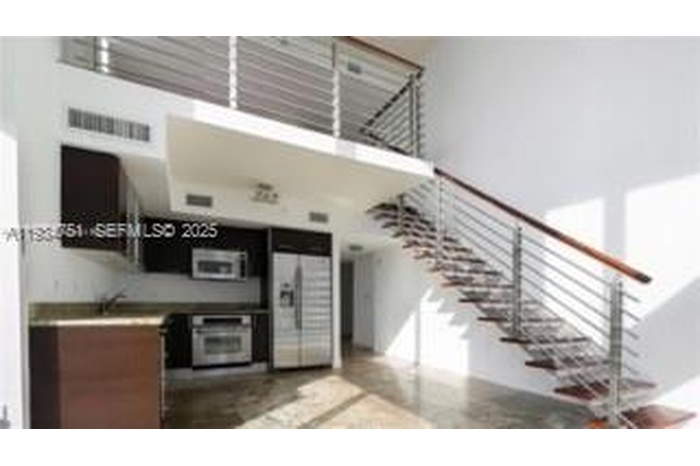 LIVING ROOM AND KITCHEN