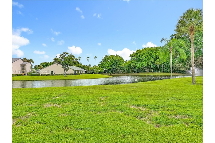 Enjoy lake views from living & master bedroom