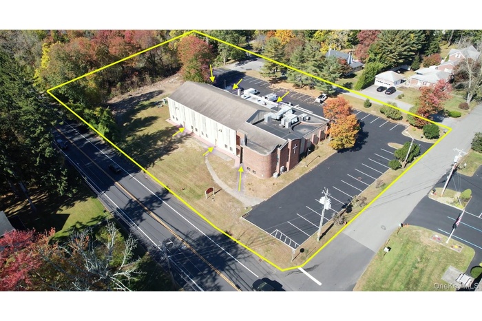 Aerial overview of property's location featuring property boundaries highlighted