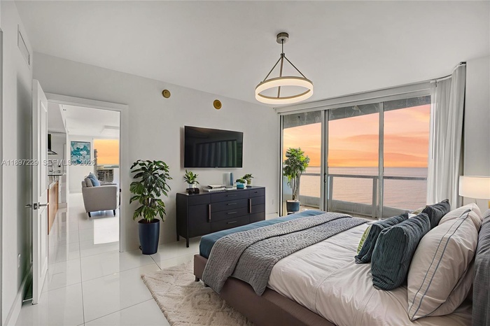 PRIMARY WITH SUNRISE VIEWS FROM YOUR BED!