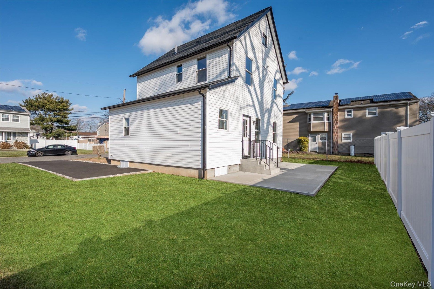 Back of house featuring a patio