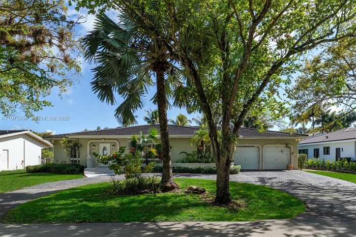 Tree-lined street in Gables by the Sea