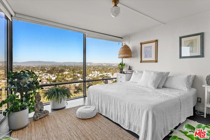Bedroom with floor-to-ceiling