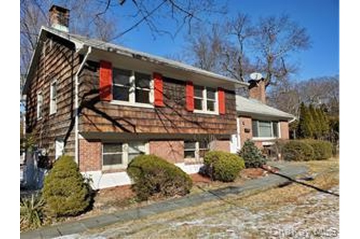 Tri-level home with a chimney