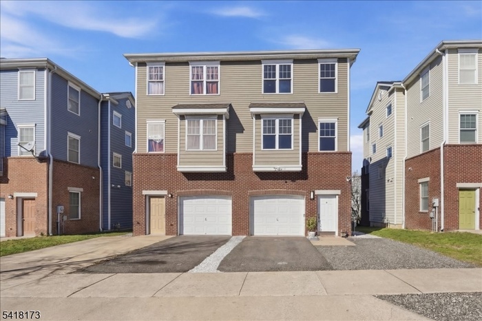 1 GARAGE & 2 PARKING SPACES