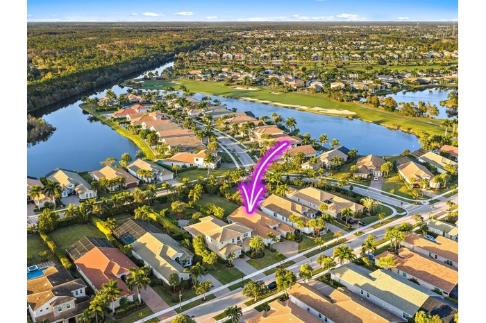 Aerial of single-family home located in Jupiter Country Club.