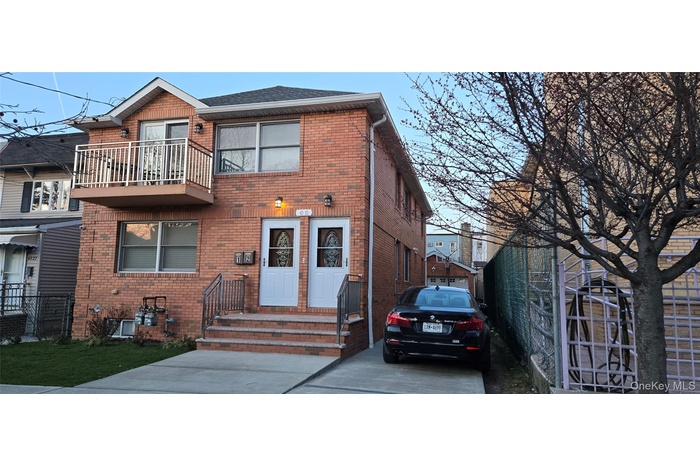 Showing two separate entrances, 1.5 car Garage and Driveway.
