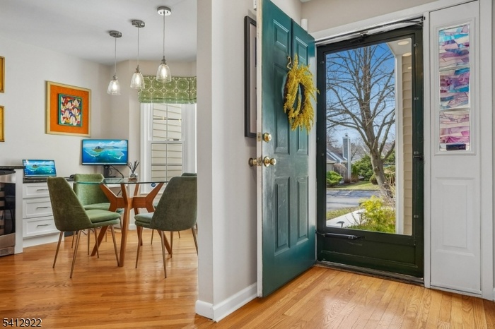 Warm wood floors welcome you