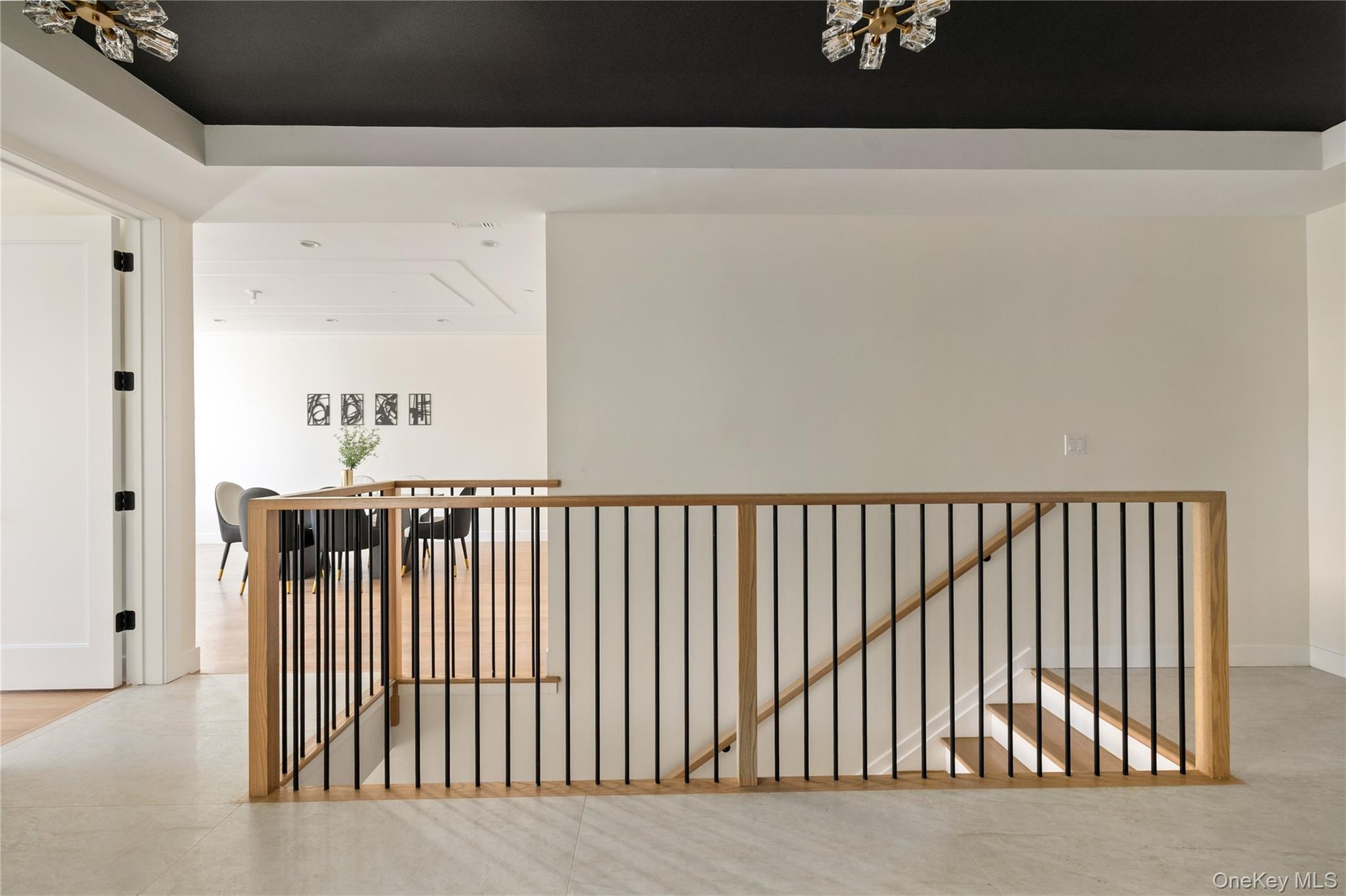 Hall featuring an upstairs landing