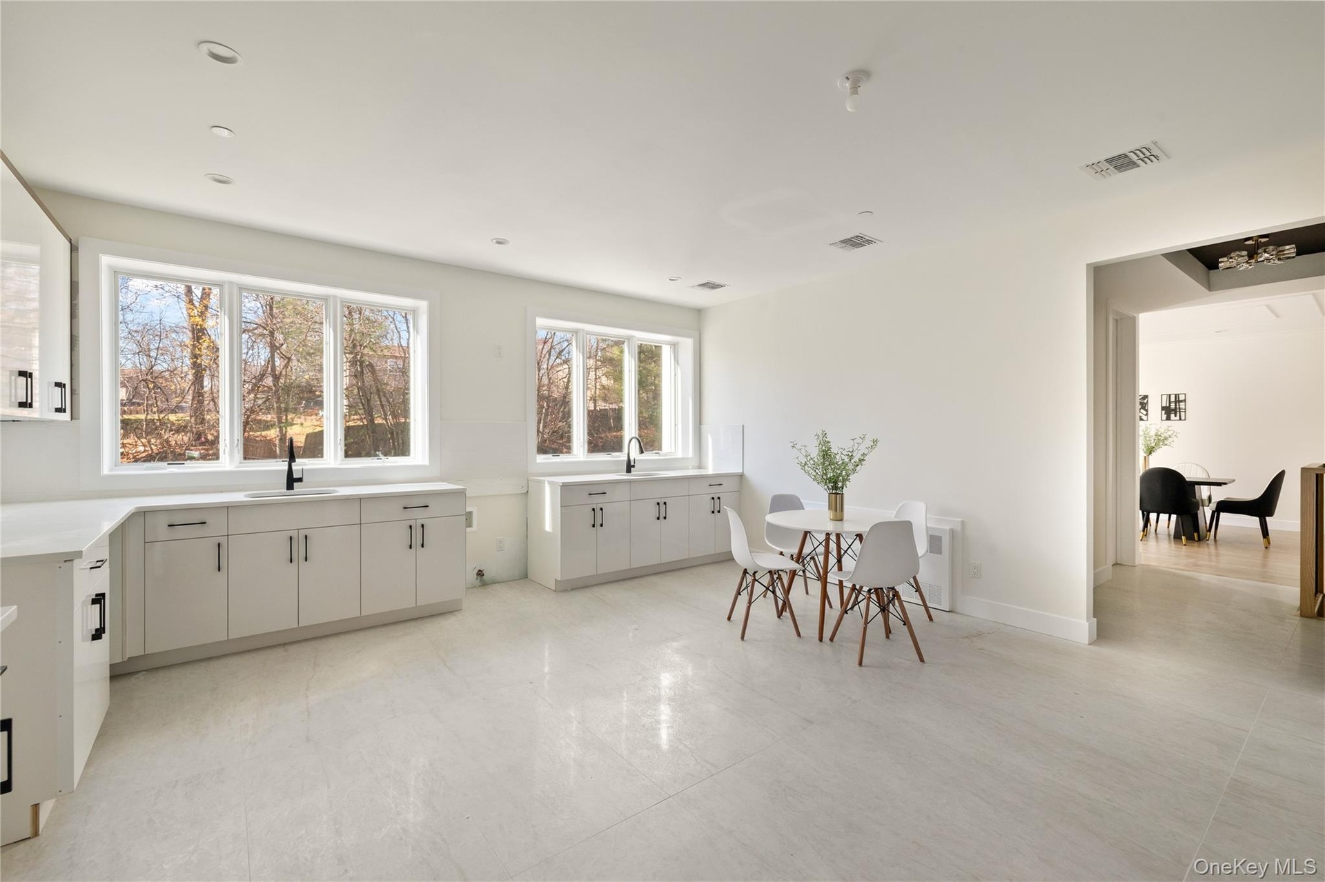 Dining room with baseboards and radiator heating unit
