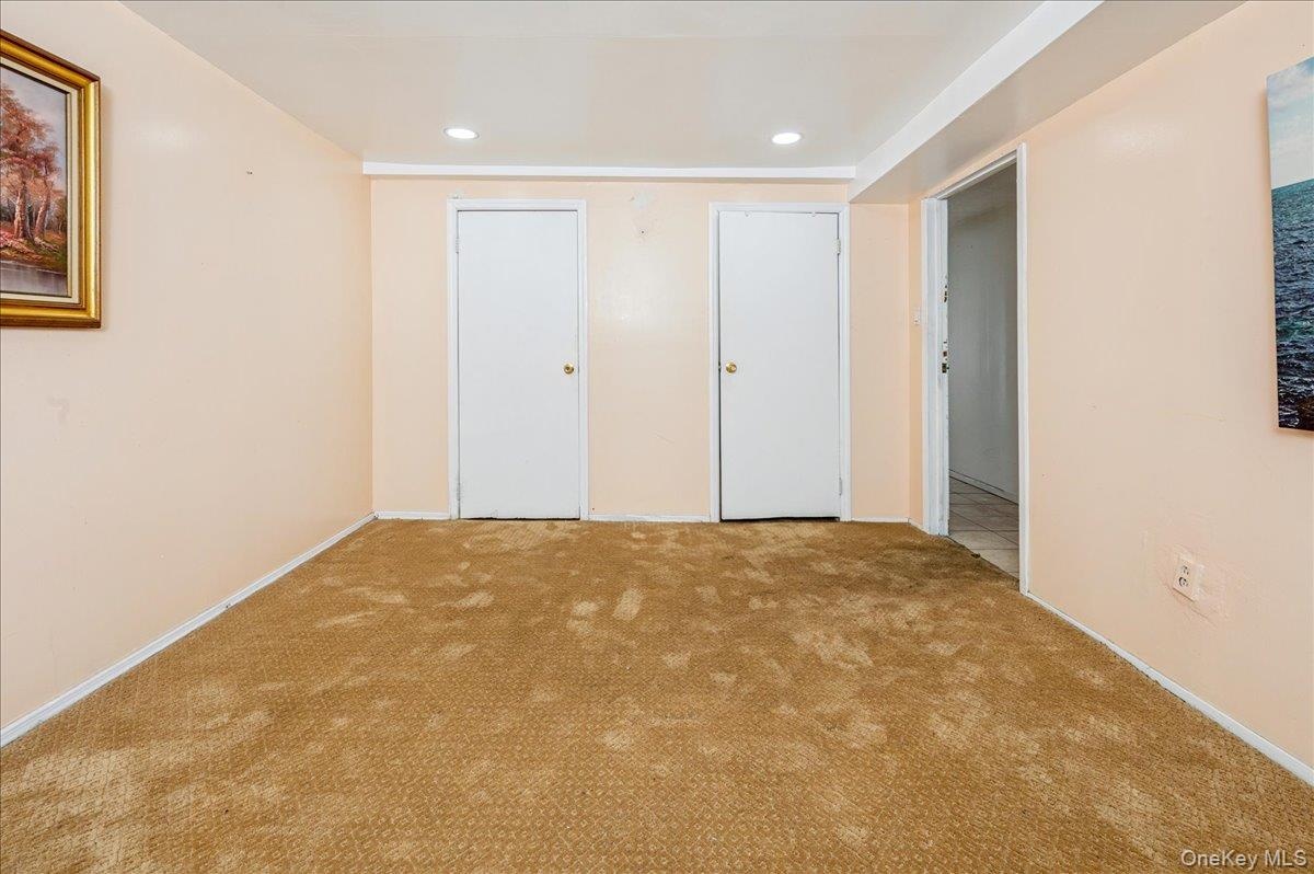 Carpeted third bedroom (on first floor)