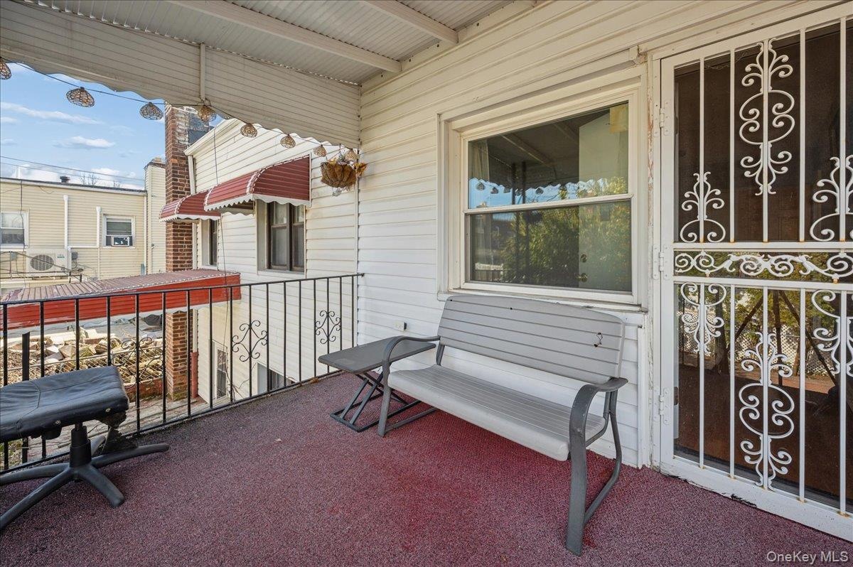 View of balcony, from primary bedroom