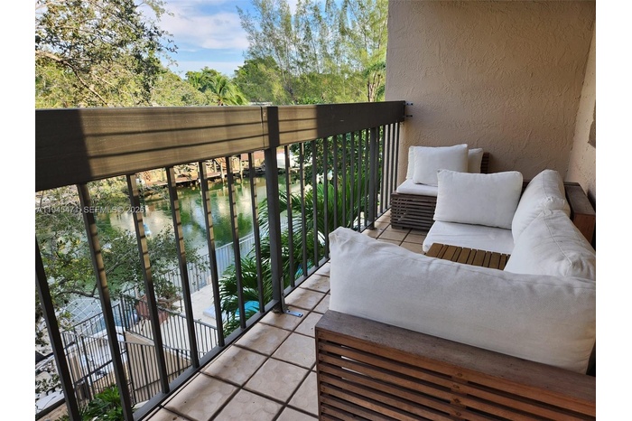 Best view in the house! Enjoy the peaceful view from this extensive balcony which extends the length of the unit.