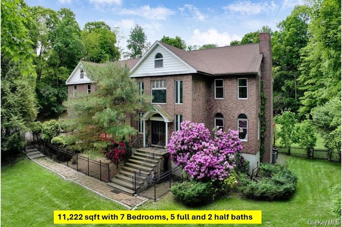 Beautiful Brick home with over 11,000 sqft, 7 bedrooms and 5 full and 2 half baths