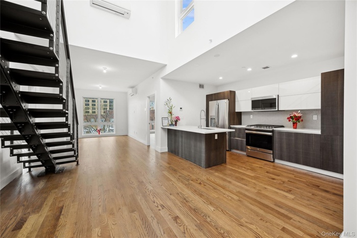 Open-Eat-in Kitchen! modern European cabinets! Quartz countertops! stainless steel appliances! open floor plan!