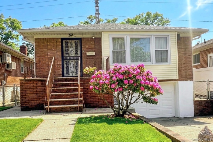 View of front facade with an attached garage