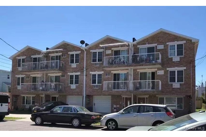 Multi-level brick exterior building with peaked gables