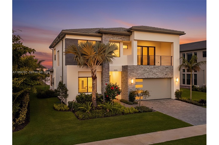 East facing front of home next to tree-lined easement on south side