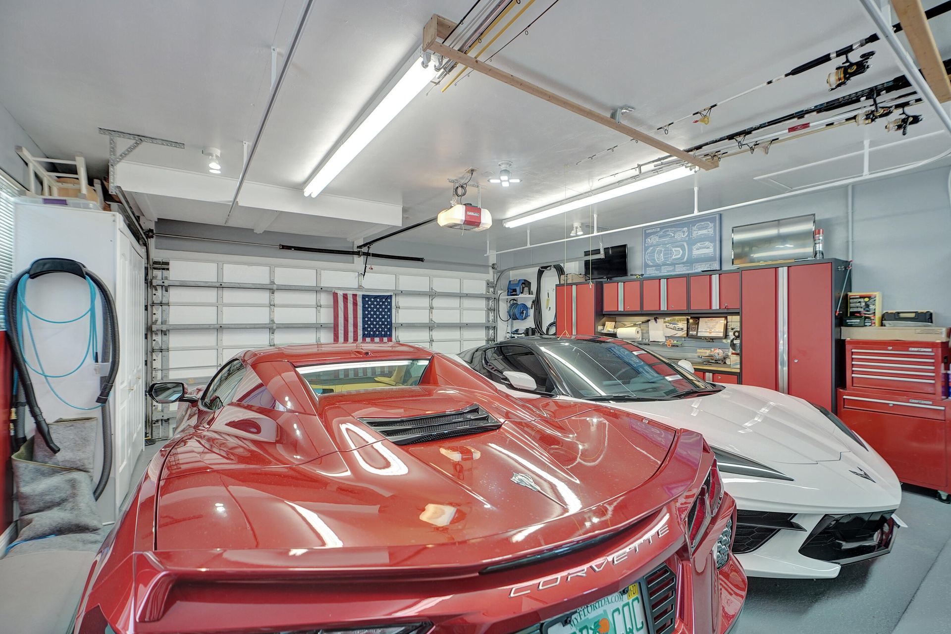 Garage has separate AC and has tons of space, epoxy floor and great storage