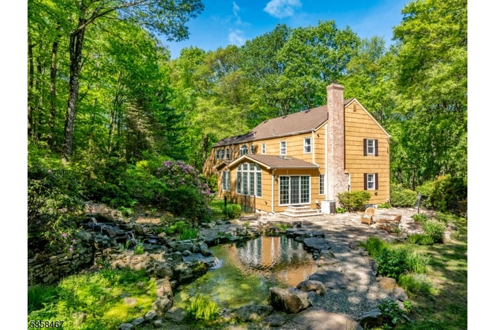 Woodland Colonial with Pond