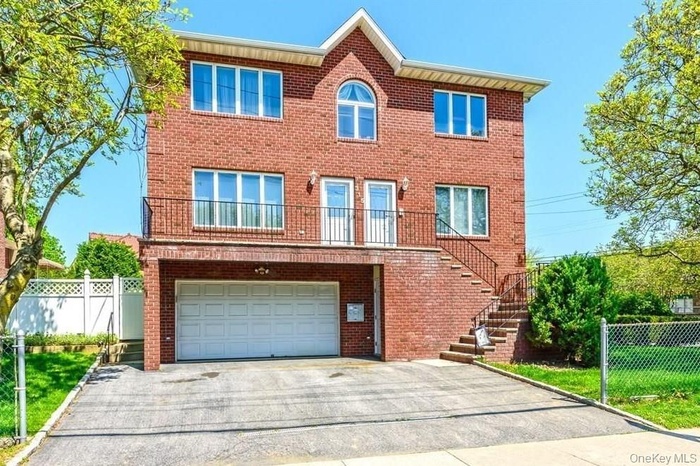 Front elevation with parking.