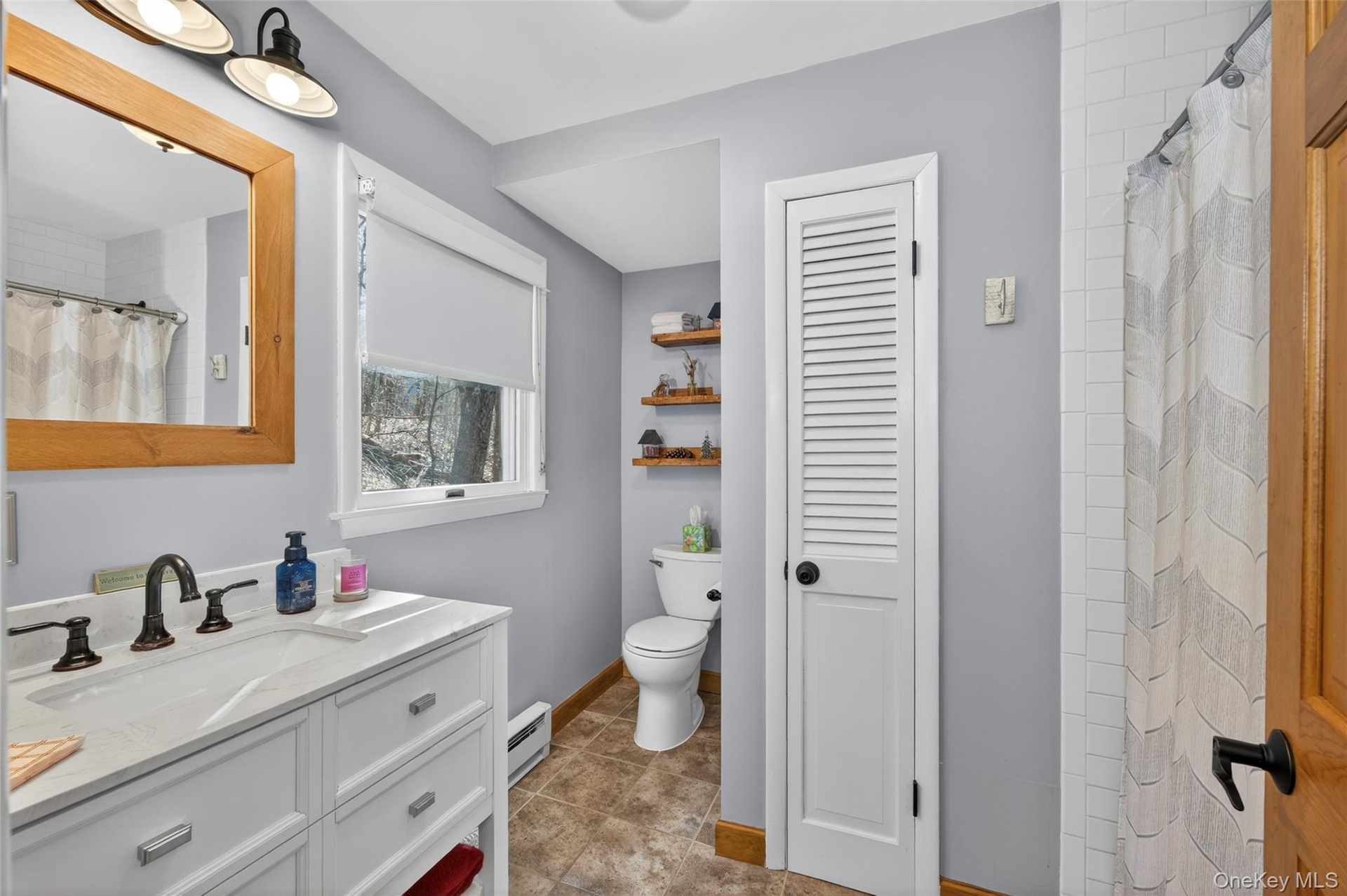 Full bath with tub off kitchen