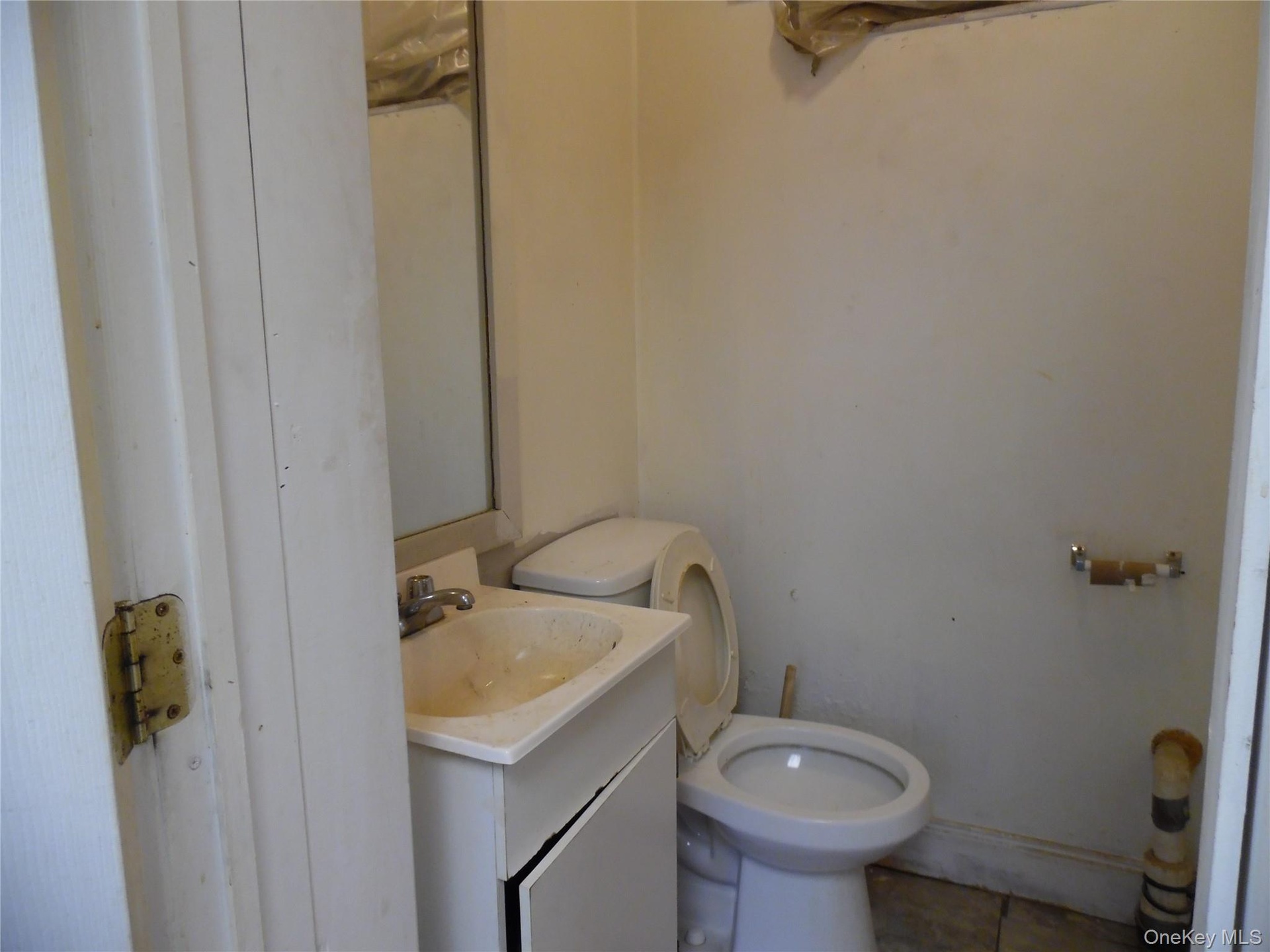 Bathroom with vanity and tile patterned flooring