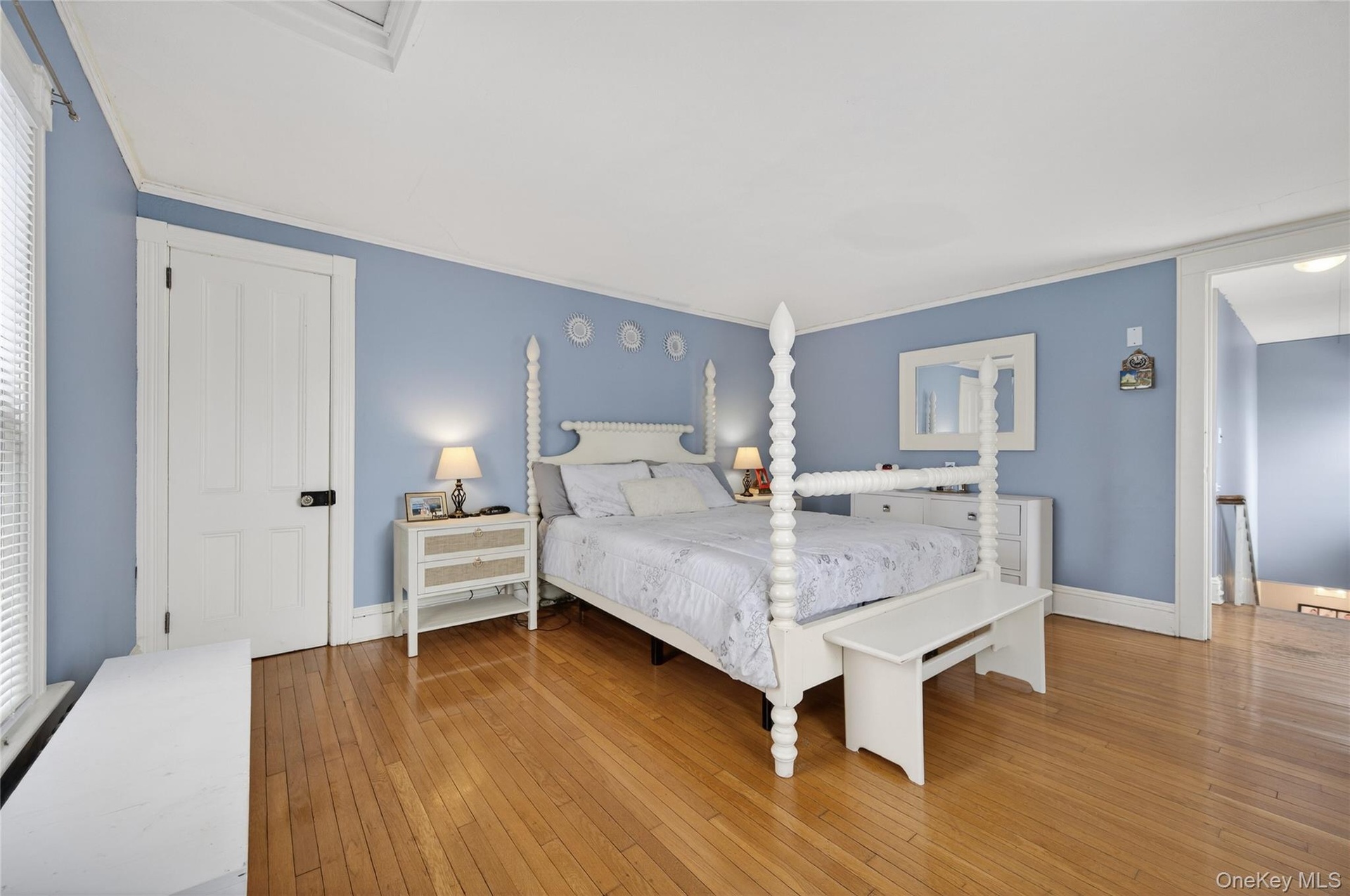 Primary bedroom with walk in closet.
