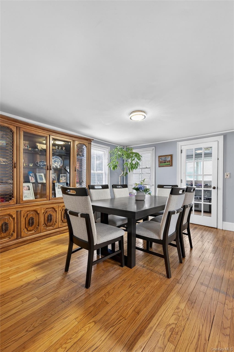 Formal Dining Room with hardwood floors  and plenty of space for enjoyable entertaining or intimate dining.