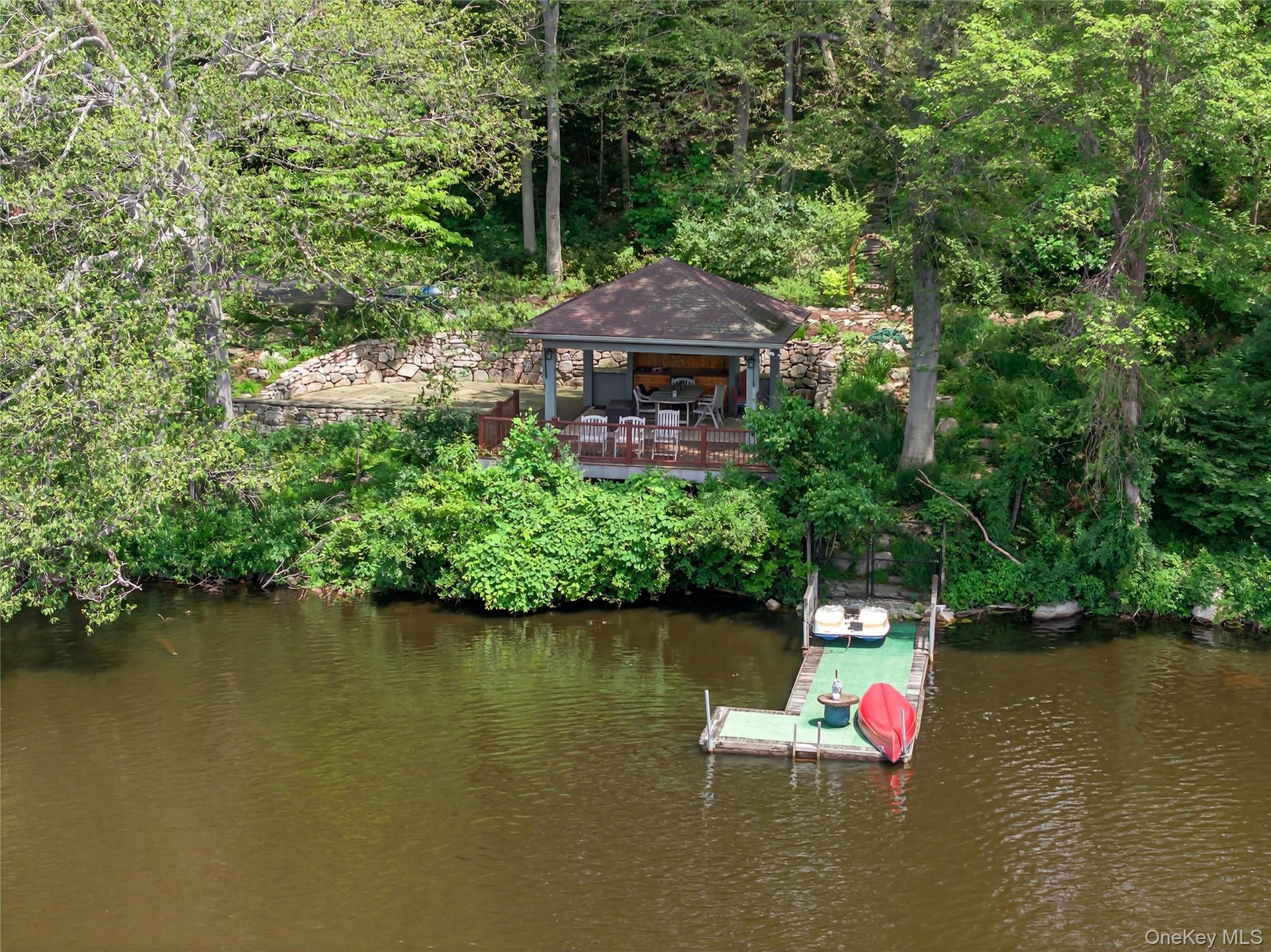 View of subject property featuring a nearby body of water