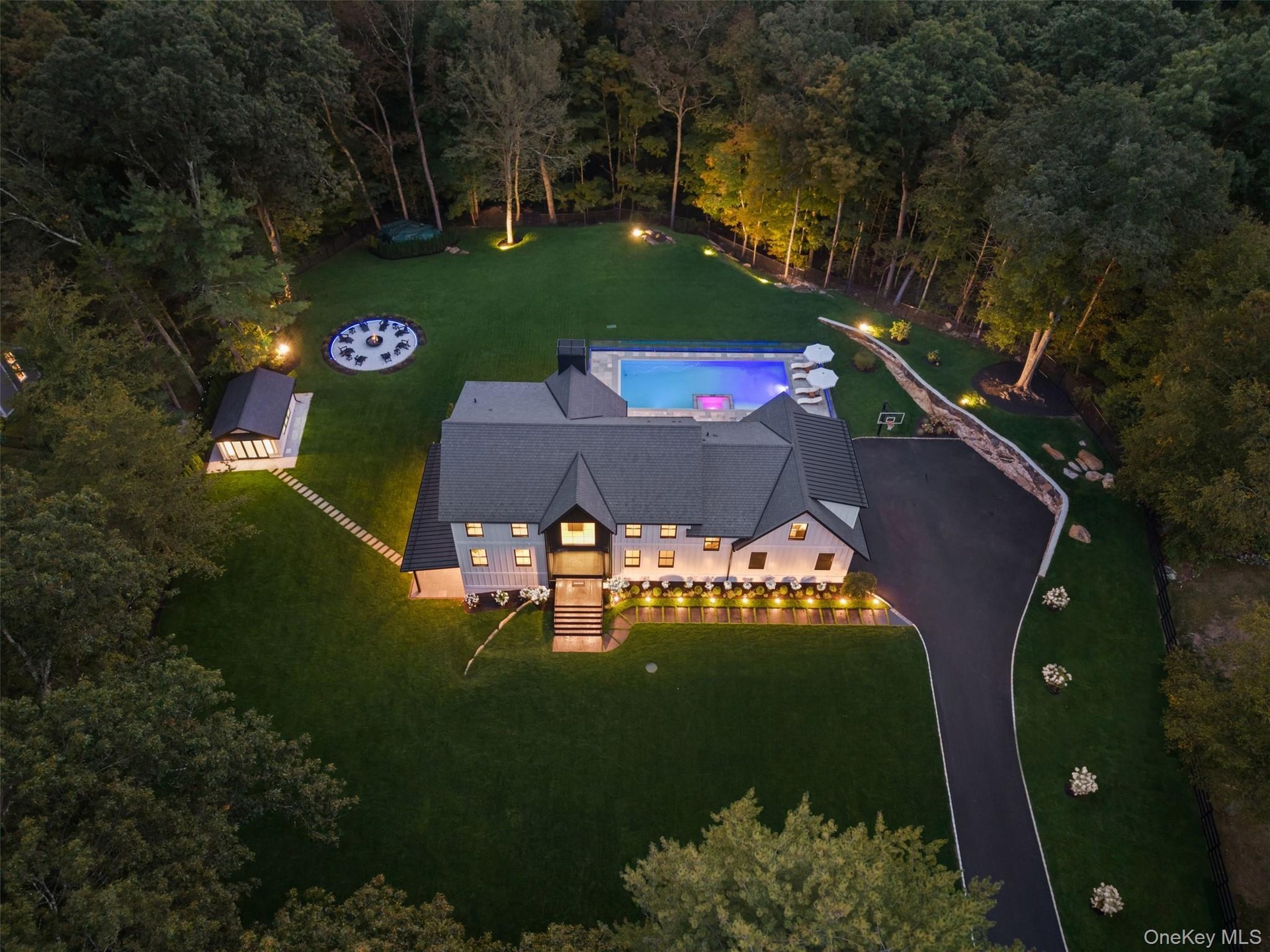 View from above of property featuring a forest