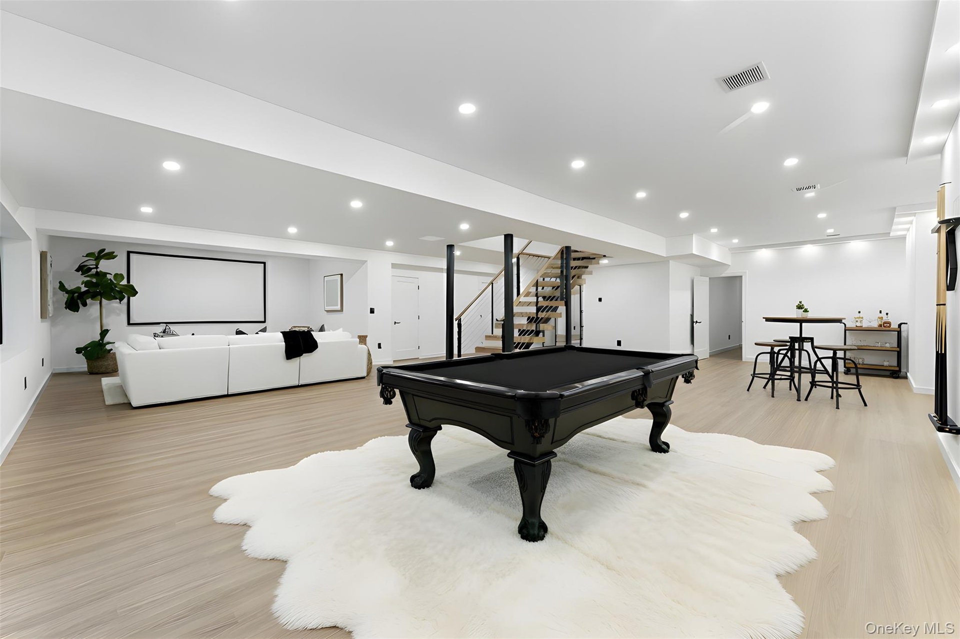 Recreation/Finished Basement featuring pool table, light wood-style floors, and recessed lighting