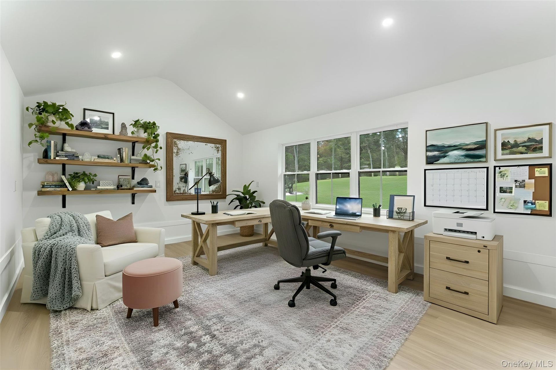 Office/Studio/Workshop area in shed to the left of the property with light wood finished floors, vaulted ceiling, and recessed lighting