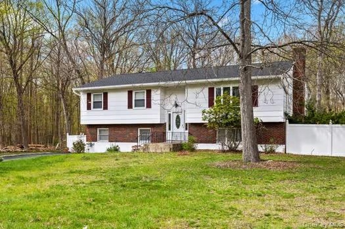 Inviting ranch with large private yard and in-ground pool