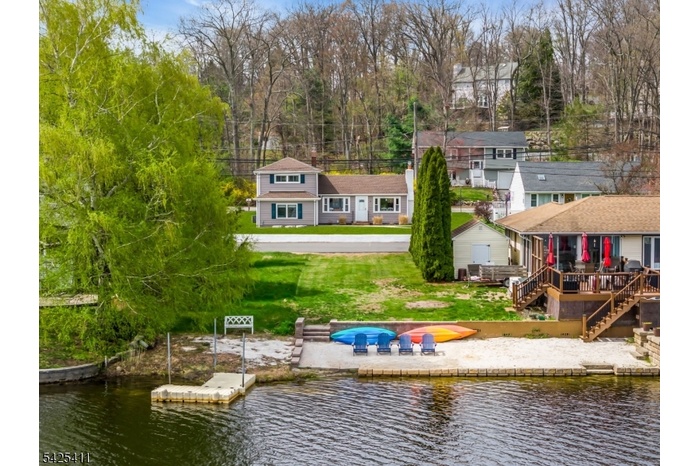 View of lakefront beach & home