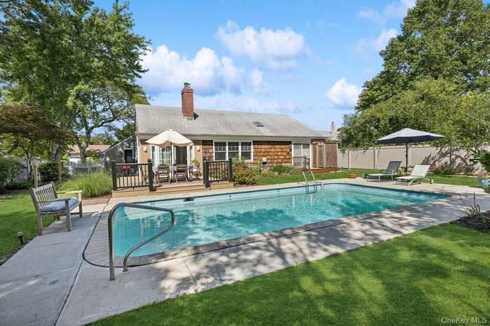 View of pool and rear of home