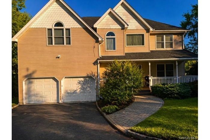 Partially Staged picture of front house