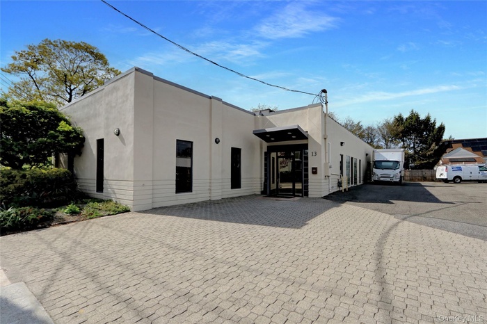 View of front of house with stucco siding