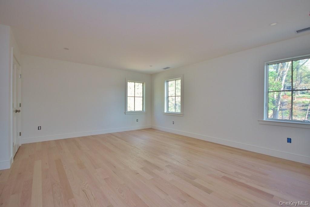 Bedroom has hardwood floors